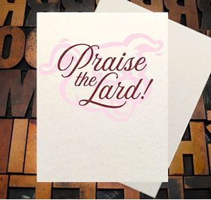 Letterpress Card with an image of a Torch, arrow, and vines