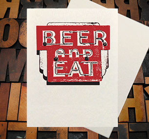Letterpress Card with the image of an owl holding a wine glass in his foot and leaning towards the left