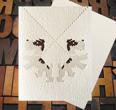Letterpress Card with an image of a pair of Airedales on leashes