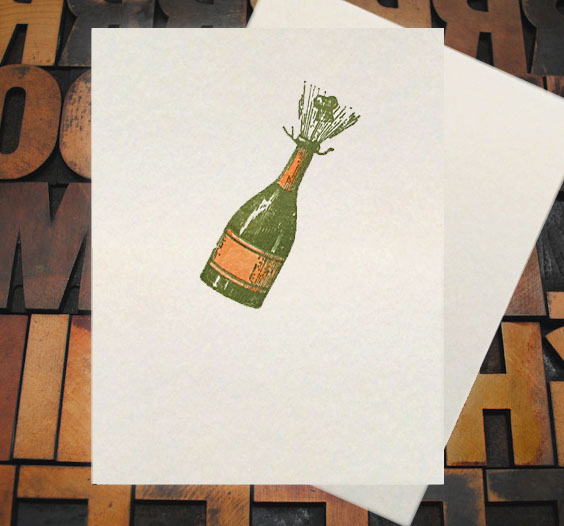 Letterpress Card with an image of a champagne bottle popping
