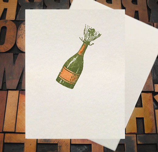 Letterpress Card with an image of a champagne bottle popping