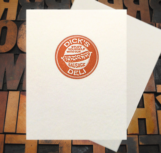 Letterpress Card with a vintage emblem containing the text, "Dicks Deli—Stuff Yourself With Our Sausage" and an image of a sausage