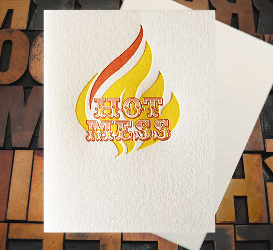 Letterpress Card with the words "Hot Mess" over top of a styleized flame