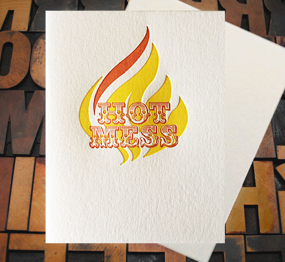 Letterpress Card with the words "Hot Mess" over top of a styleized flame