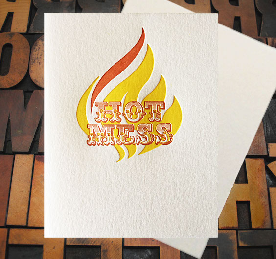 Letterpress Card with the words "Hot Mess" over top of a styleized flame
