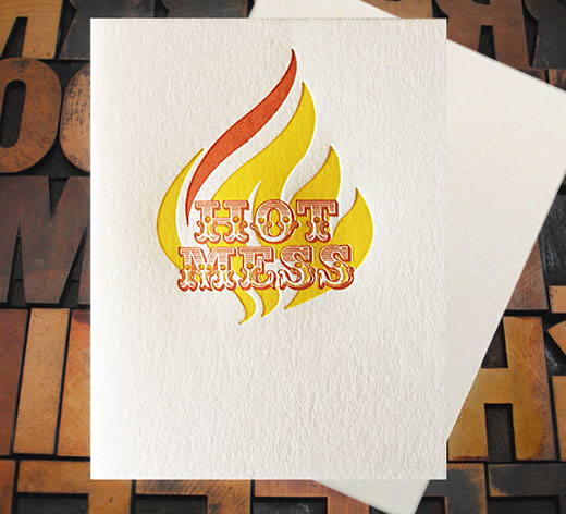 Letterpress Card with the words "Hot Mess" over top of a styleized flame
