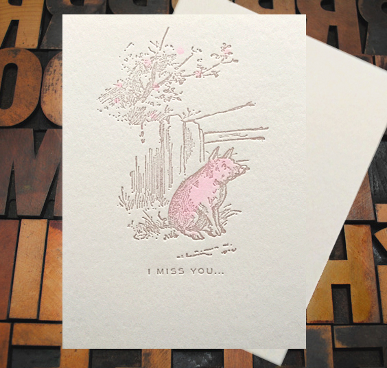 Letterpress Card with an image of a pig sitting near a fence with the text, "I miss you"
