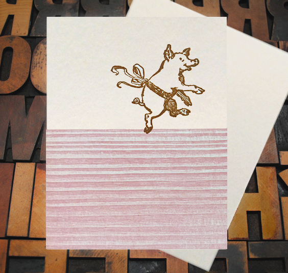 Letterpress Card with an image of a pig wearing a ribbon dancing
