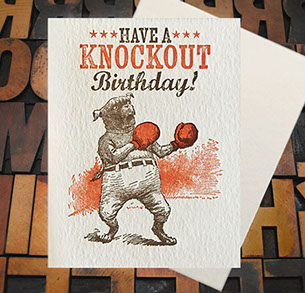 Letterpress Card with an image of a dog dressed as a boxer with the text, "Have a KNOCKOUT Birthday!"