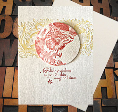 Letterpress Card with raised Santa disc and the text, "Holiday wishes to you at this magical time"