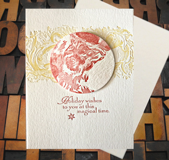 Letterpress Card with raised Santa disc and the text, "Holiday wishes to you at this magical time"