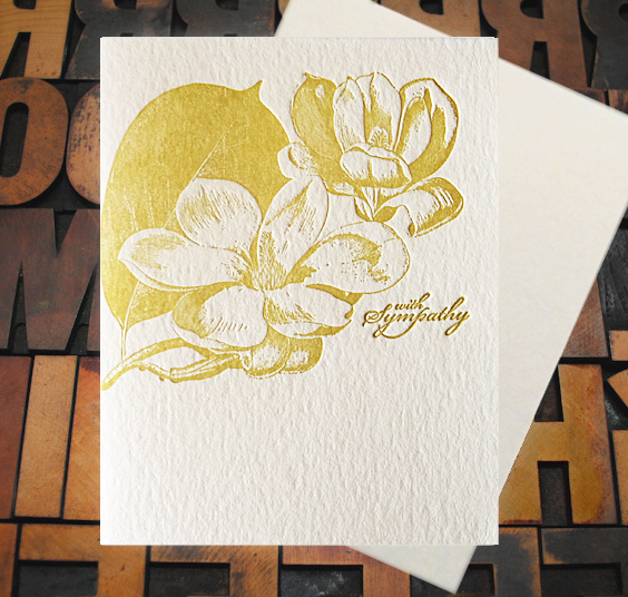 Letterpress Card with an image of magnolia blossoms and the text, "With Sympathy"