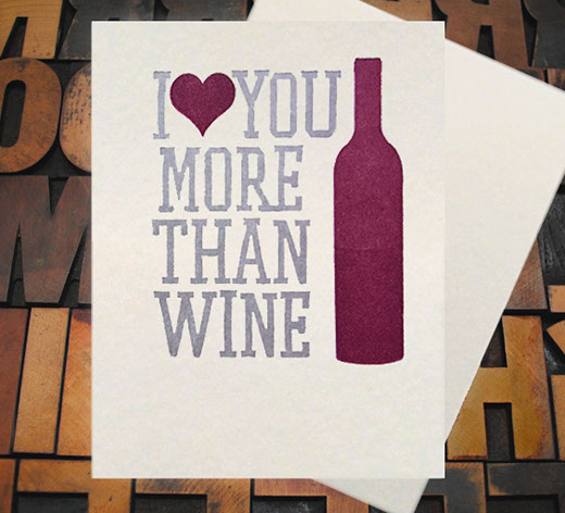 Letterpress Card with an image of a wine bottle and the text, "I -heart shape- you more than wine"