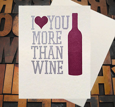 Letterpress Card with an image of a wine bottle and the text, "I -heart shape- you more than wine"