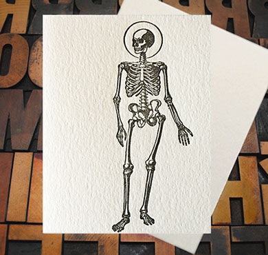Letterpress Card with an image of a skeleton with a halo