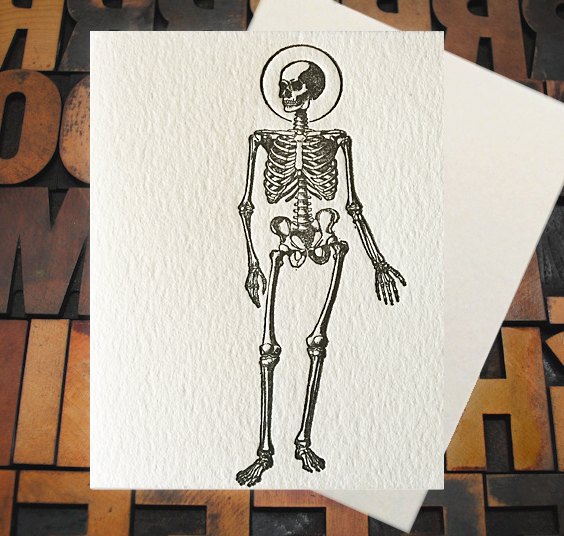 Letterpress Card with an image of a skeleton with a halo