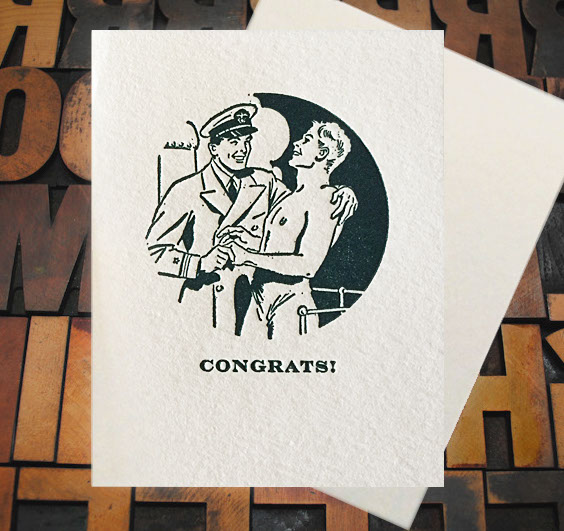 Letterpress Card with an image of an officer and a topless gentleman embracing over the text, "Congrats!"