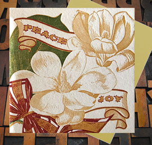 Letterpress Card with ribbons, Magnolia blossoms, and the text, "Peace & Joy"
