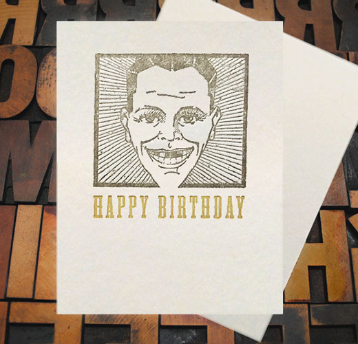 Letterpress Card with an image of a man smiling, yet missing teeth, with the text, "Happy Birthday!"