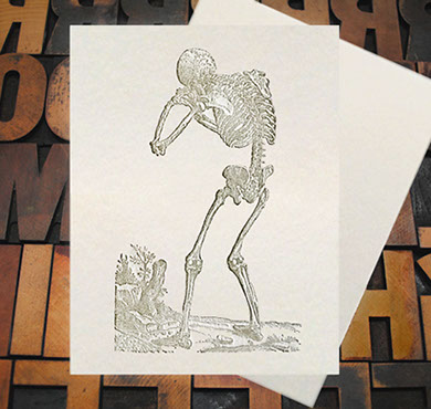 Letterpress Card with an image of a very sad skeleton