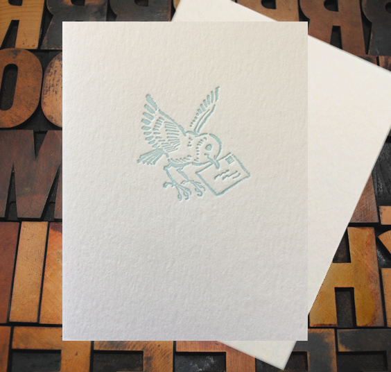 Letterpress Card with an image of a blue bird carrying a letter in its beak