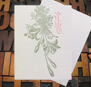 Letterpress Card with an image of lilies and the text, "With Sympathy."