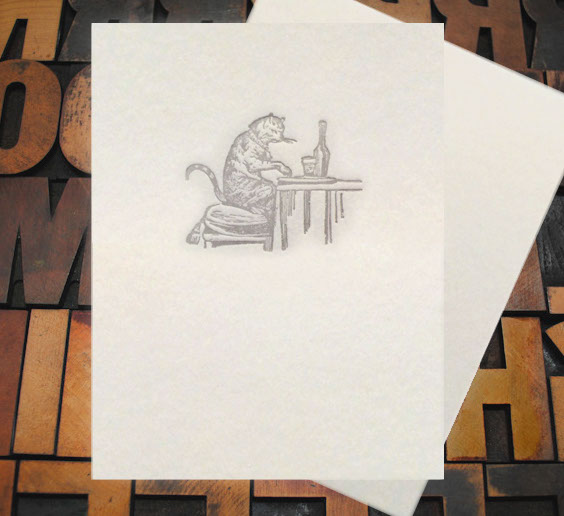 Letterpress Card with the image of a cat drinking wine and eating cheese