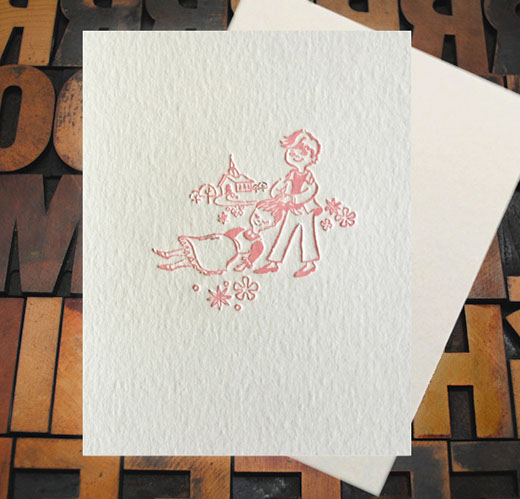 Letterpress Card with an image of a young man dragging an unconcious, yet smiling, woman by the hair towards a chapel