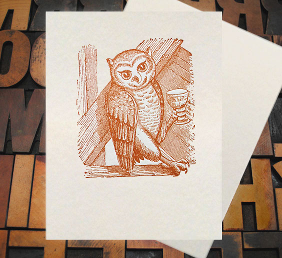 Letterpress Card with the image of an owl holding a wine glass in his foot and leaning towards the left