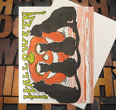 Letterpress Card with an image of four black cats, a jack-o-lantern, and the text, "Happy Halloween"