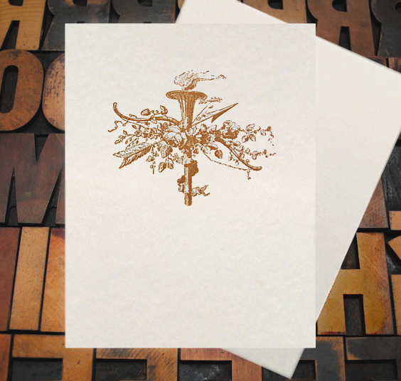 Letterpress Card with an image of a Torch, arrow, and vines