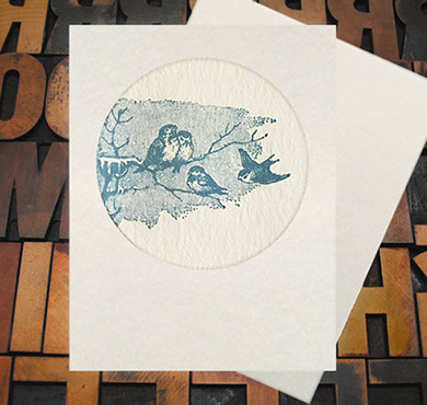 Letterpress Card with an image of blue birds sitting on a branch in the winter